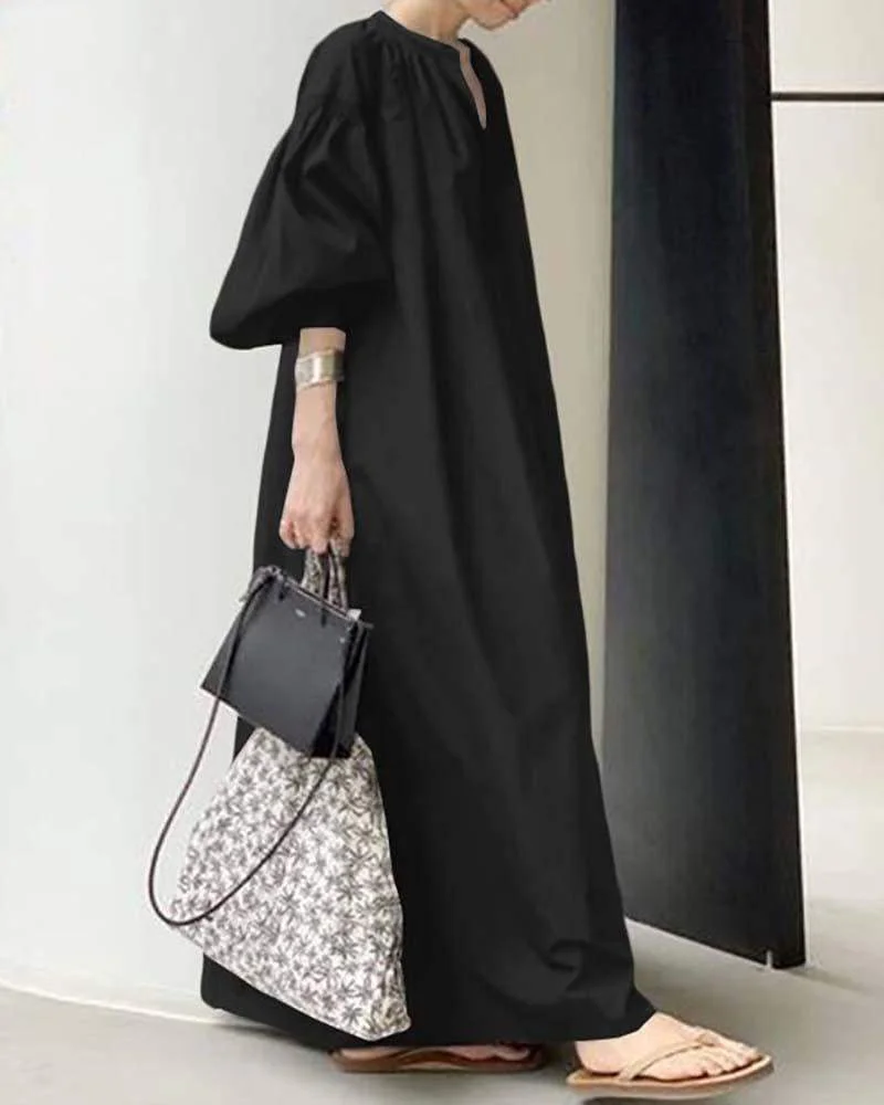 Loose dress with balloon sleeves