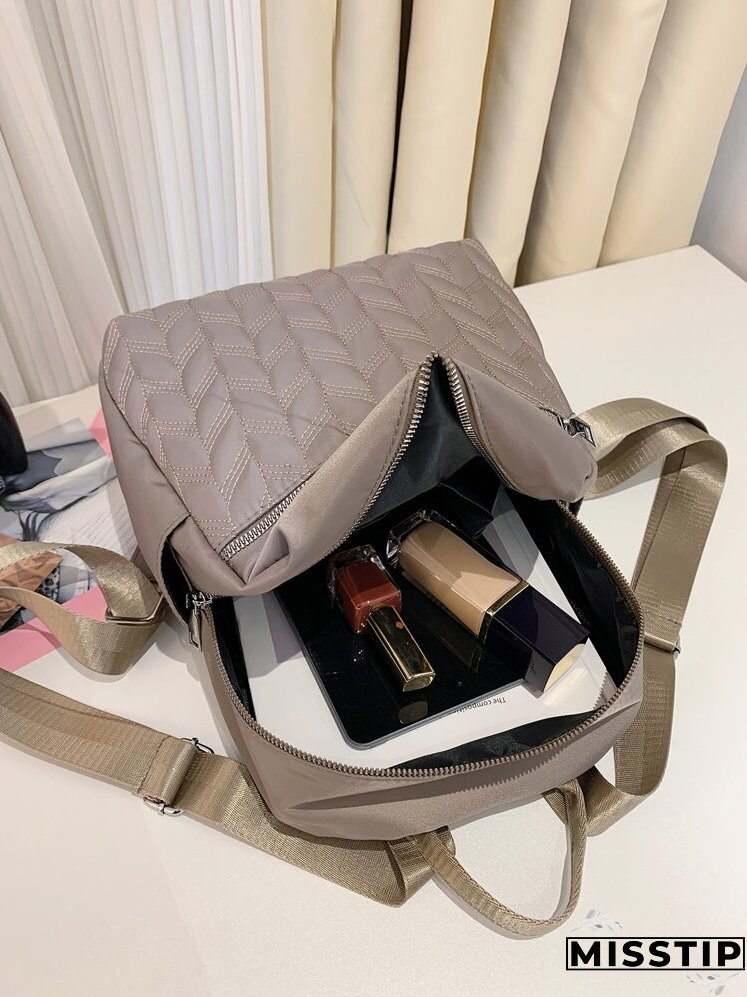 Metal Decor Quilted Backpack