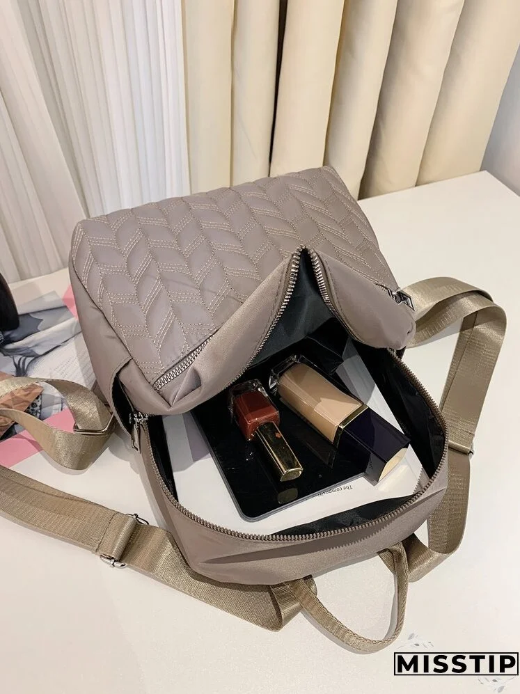 Metal Decor Quilted Backpack
