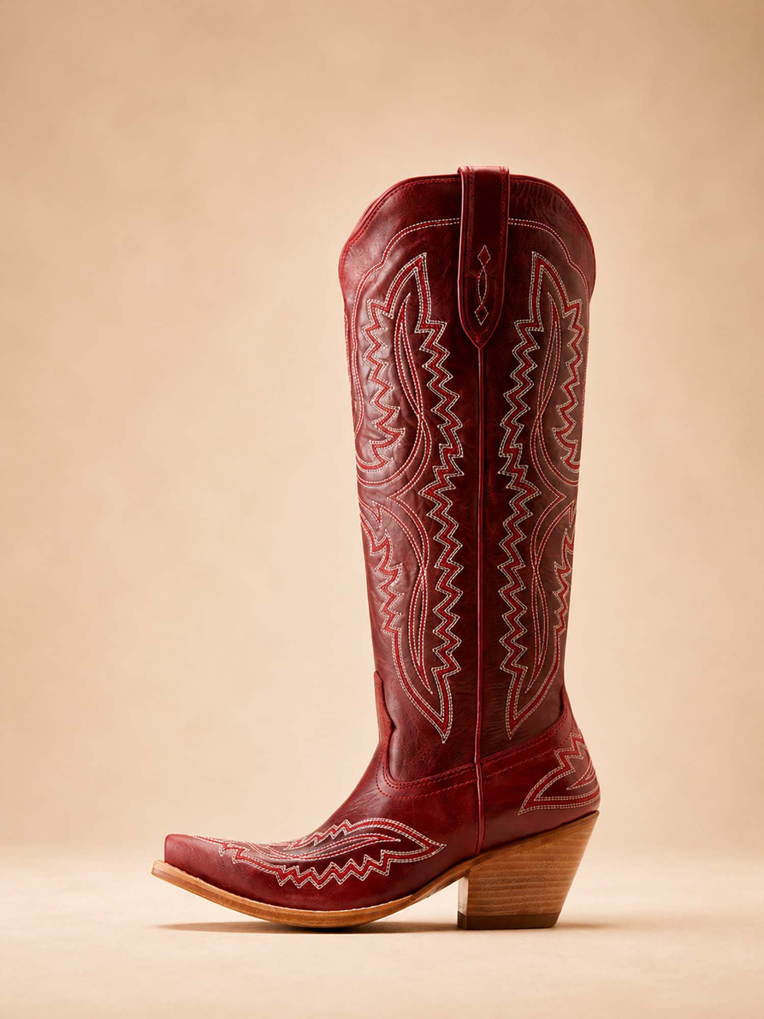 The perfect choice for a country music festival: women's denim boots for Spring/Summer 2026 featuring retro flame and geometric embroidery.