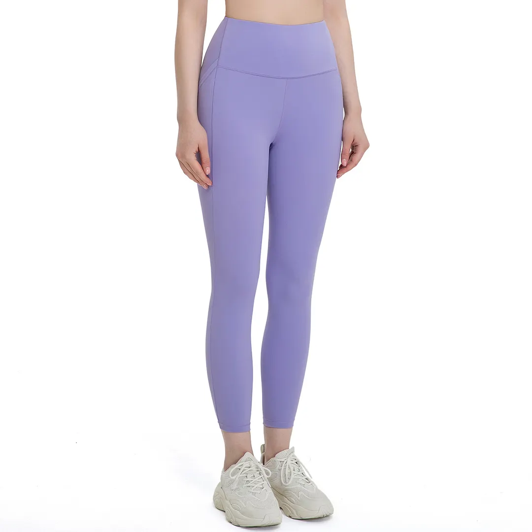 Shop high rise tranceless naked feeling slant pockets sports yoga leggings online on Hergymclothing