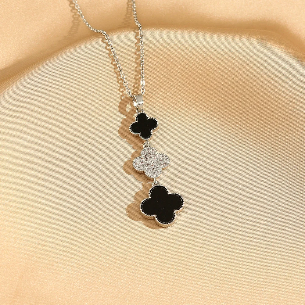 Three petals, four-leaf clover, gold-plated, zircon necklace. 