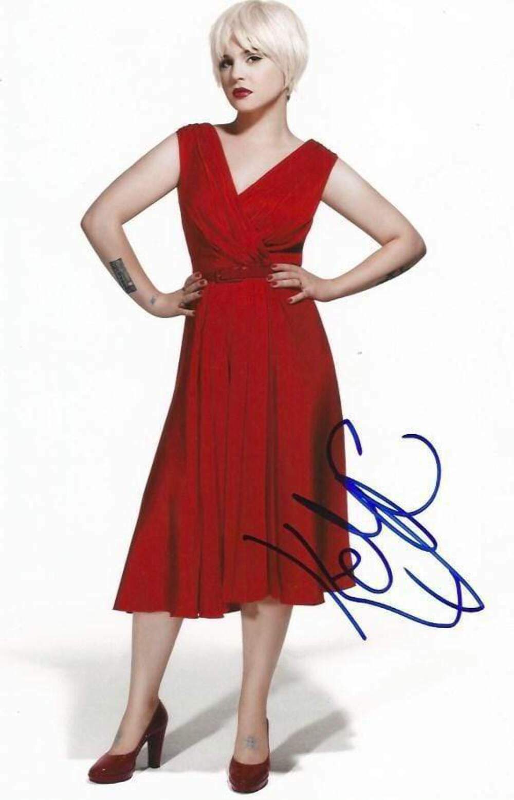 Kelly Osbourne SINGER - SONGWRITER and ACTRESS autograph, In-person signed Photo Poster painting