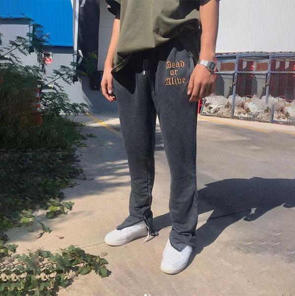 graphic-print sweatpants with slits at the bottom