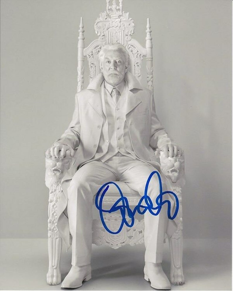 Donald sutherland signed autographed the hunger games president snow Photo Poster painting