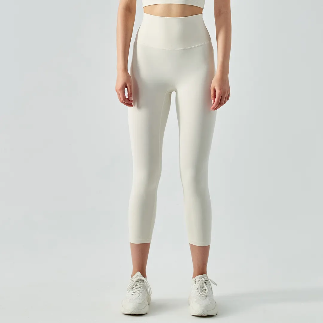 Buy different colors and types of no camel toe high waist buttery soft brushed stretchy yoga capri leggings on Hergymclothing Ivory White