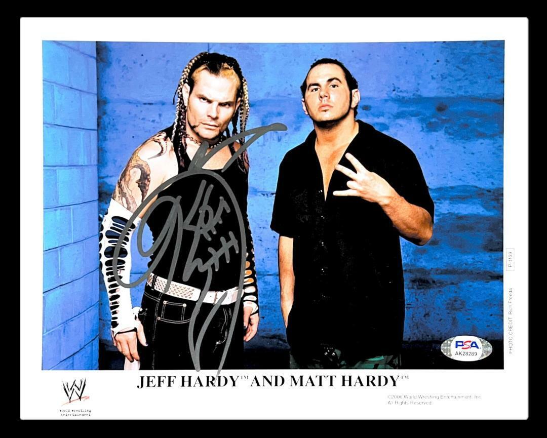 WWE JEFF HARDY P-1139 HARDYS HAND SIGNED 8X10 PROMO Photo Poster painting WITH PROOF AND PSA COA