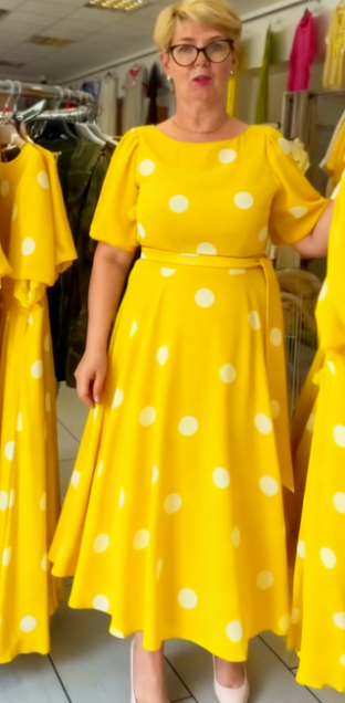 Elegancka sukienka damska z okrągłym dekoltem i wzorem w kropki w stylu retro