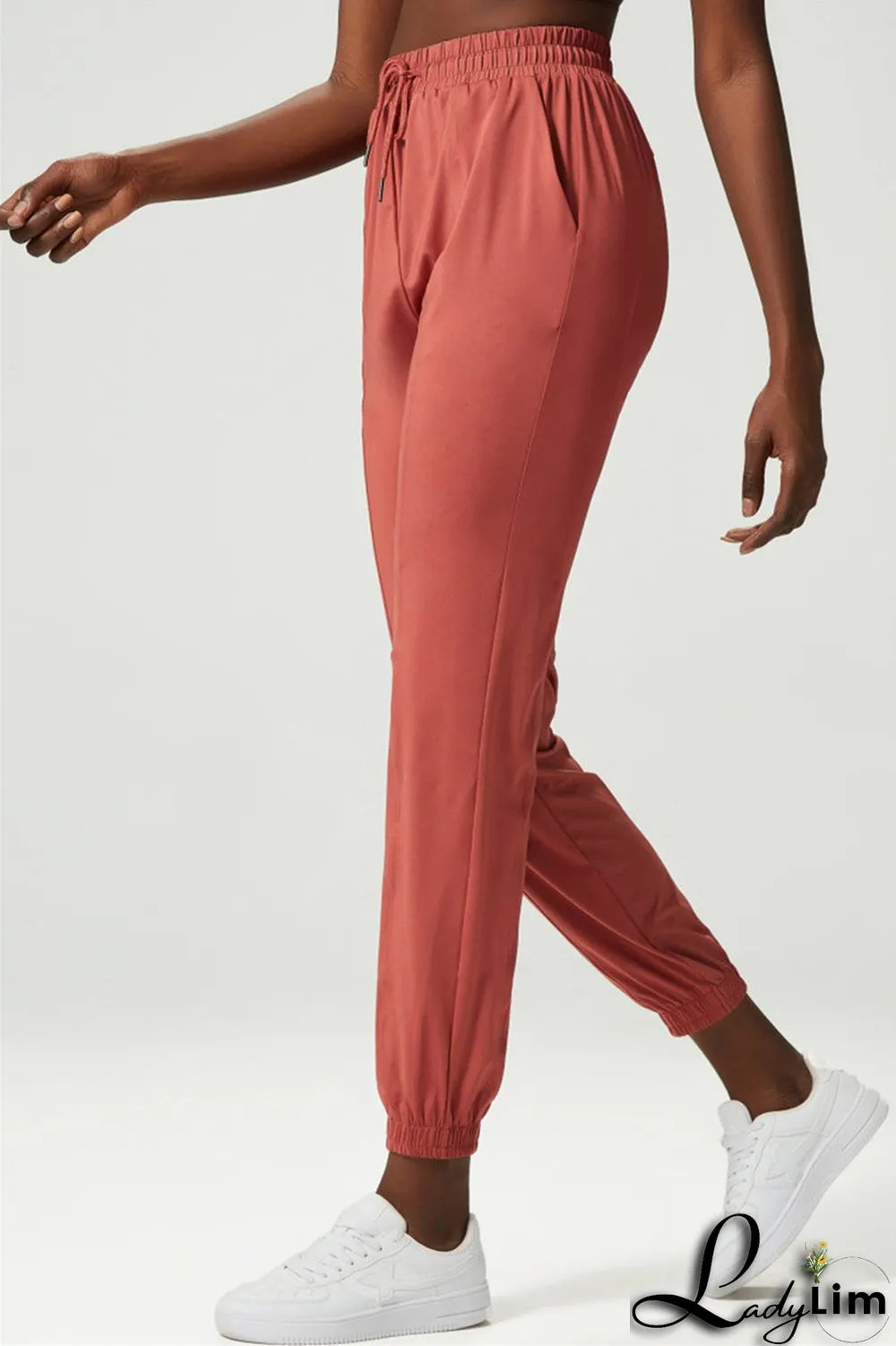 Apricot Casual Sportswear Solid Patchwork Regular High Waist Trousers