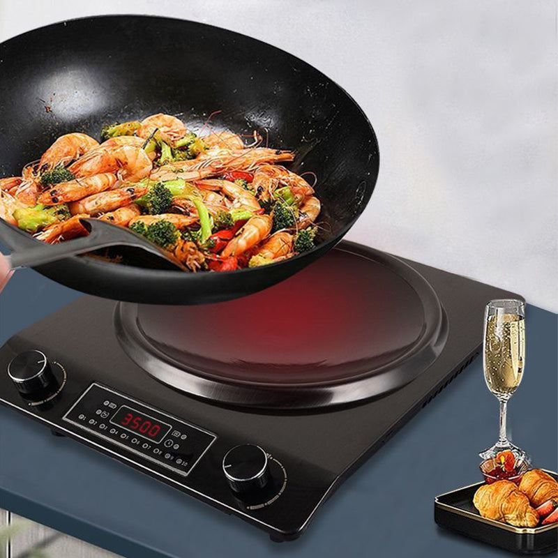 Concave induction cooktop in use