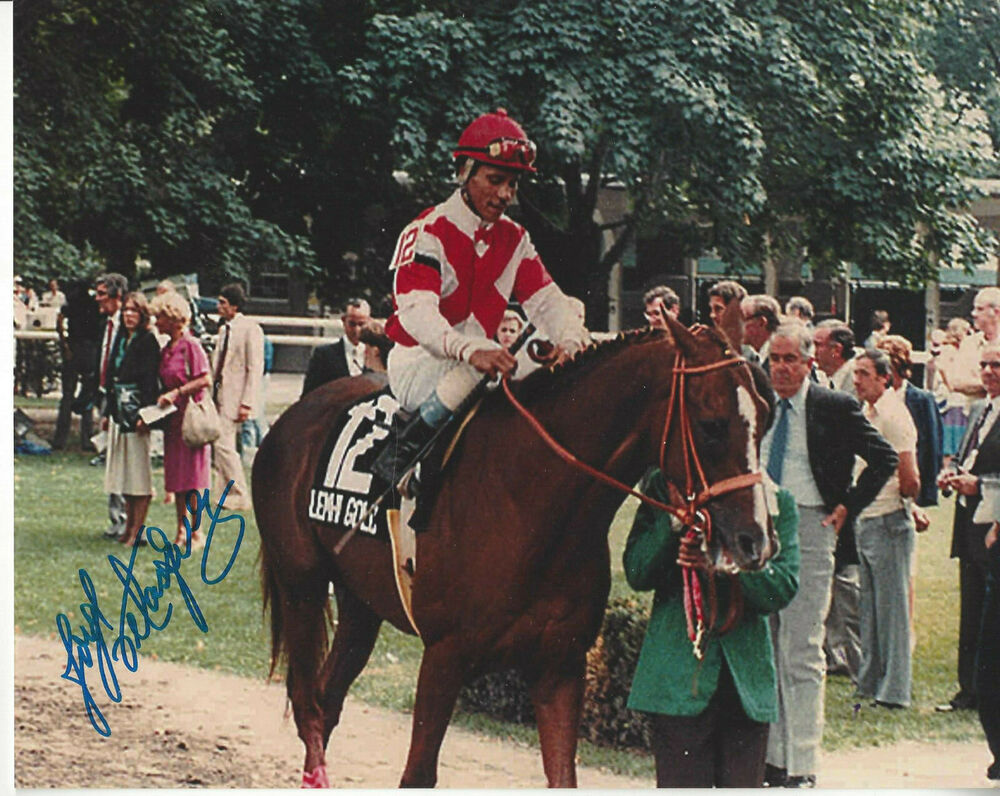 Hall of Fame Jockey Jorge Velasquez  autographed 8x10 post race color  Photo Poster painting **