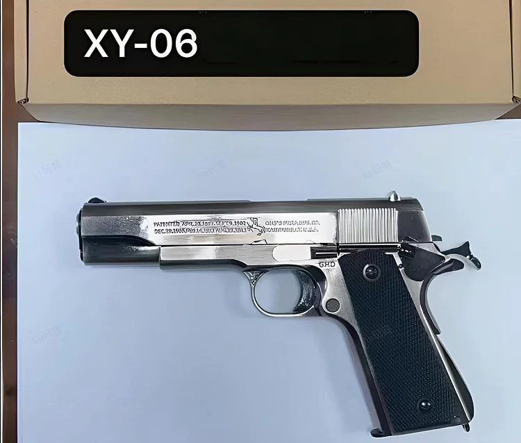 Back view of XY 1911 pull-hand toy gun, highlighting durable construction