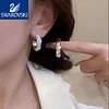 🔥 50 % popusta 🔥 Ble&scaron;čeči uhani iz belega zlata Swarovski (darilna &scaron;katla)