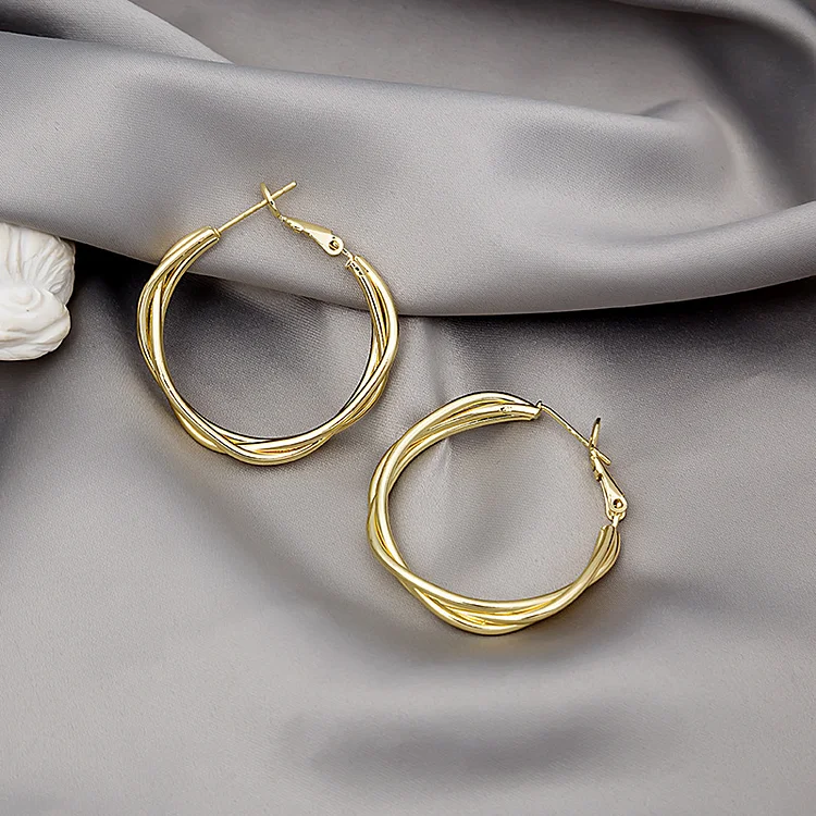 Fashion Gold Circular Twist Distorted Earrings  Flycurvy [product_label]