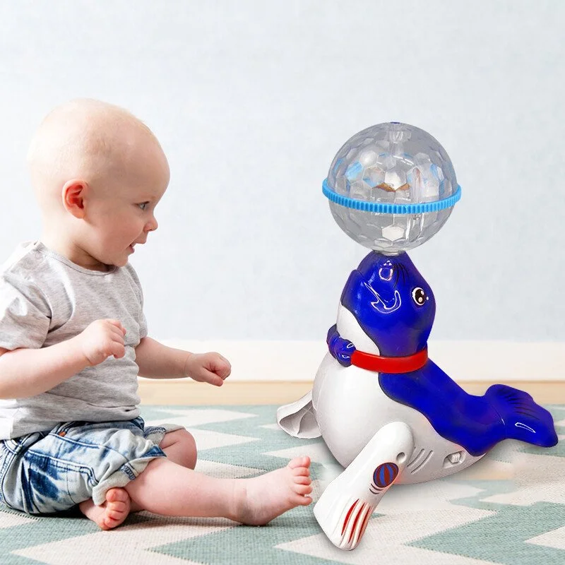 Electronic Spinning Music Sea Lion Toy
