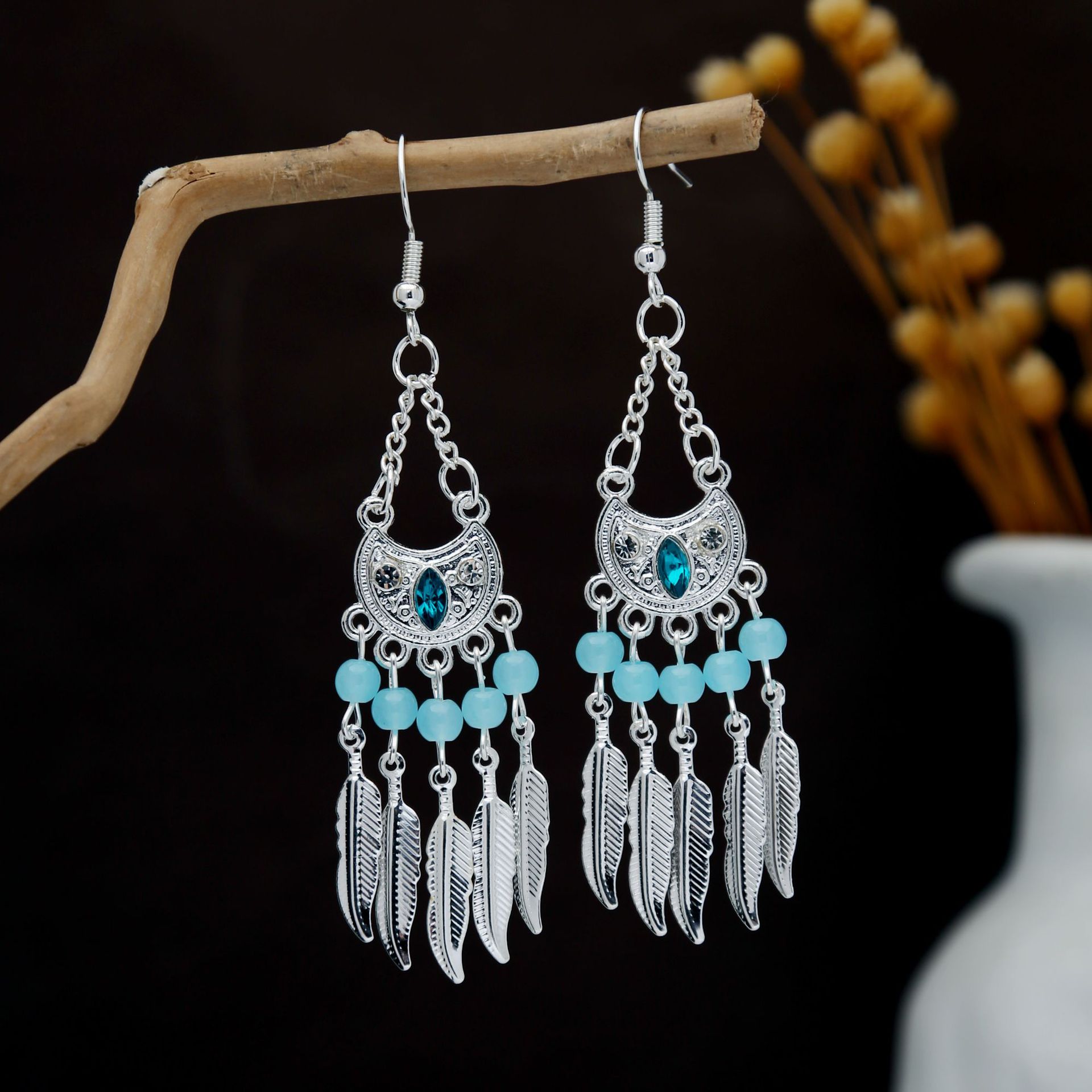 Ethnic style retro turquoise feather tassel earrings Bohemian style long earrings that make your face look slimmer popular earring style