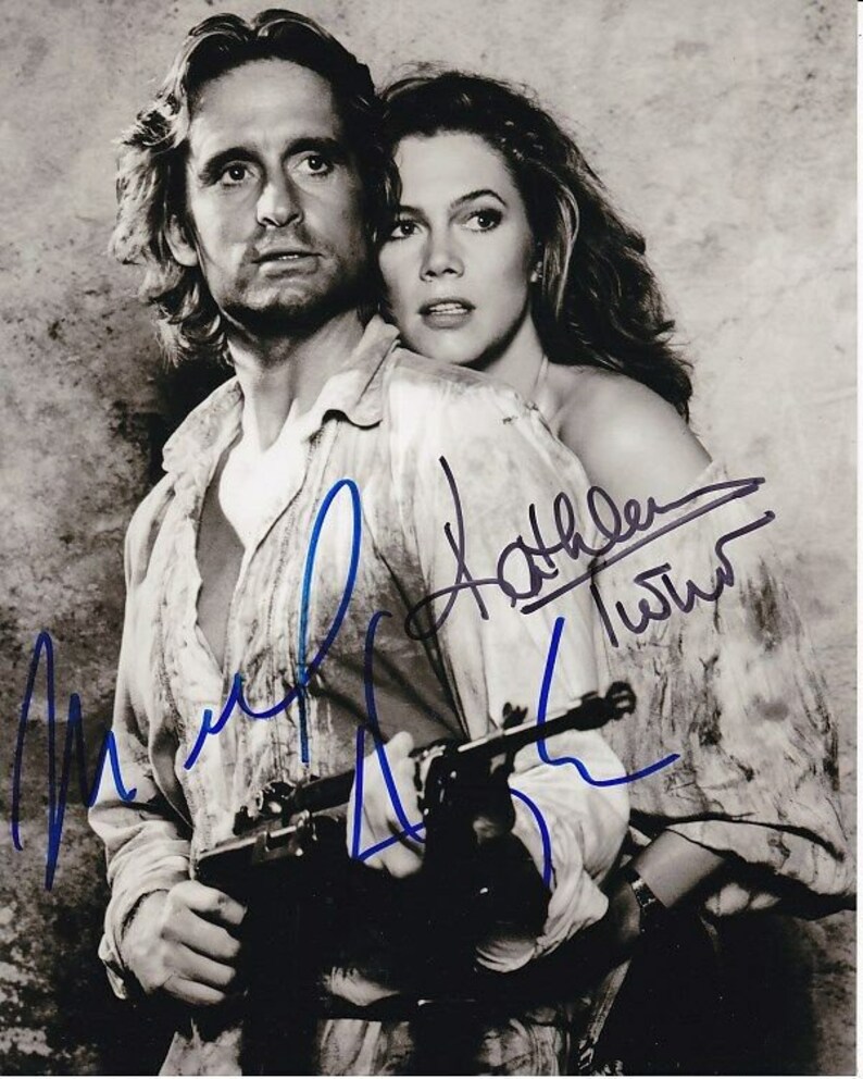 Michael douglas and kathleen turner signed autographed romancing the stone Photo Poster painting