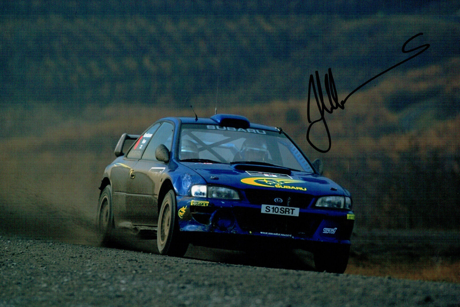 Juha KANKKUNEN RALLY WRC DRIVER SIGNED AUTOGRAPH 12x8 Subaru Photo Poster painting AFTAL COA