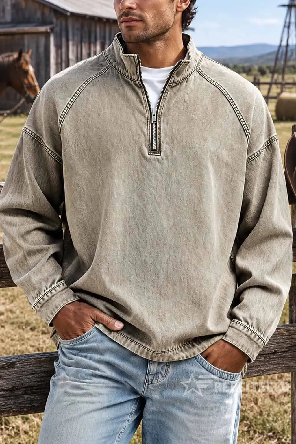 Man wearing the khaki vintage half-zip cotton pullover outdoors