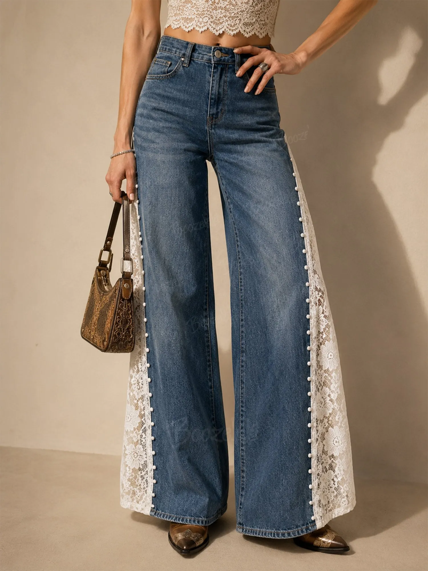 Perfect for a Western country music festival &mdash; High-waisted lace-trimmed, color-blocked, beaded wide-leg jeans