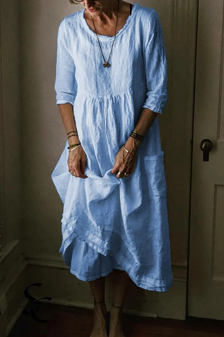 Solid Color Midi Dress with a Round Neck and 3/4 Sleeves